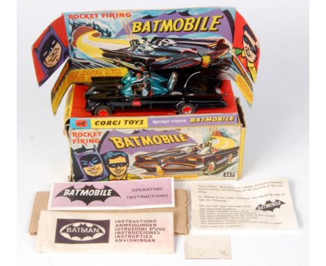 Corgi Toys, 267 Batmobile, gloss black body with red Bat logo on doors, gold cast hubs, with figures, pulsating exhaust, with
