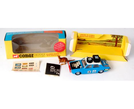 Corgi Toys, 302 Hillman Hunter Rally, blue body with white roof, matt bonnet, RN75, with equipment to roof, unused transfer s