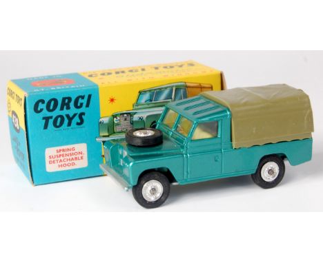 Corgi, 438 Land Rover 109" WB, metallic light green, green plastic tilt, lemon interior, detailed hubs, tiny graffiti on one 