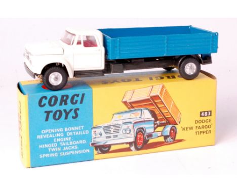 Corgi Toys, 483 Dodge 'Kew Fargo' tipper, white cab with grey chassis, with blue back and red interior, in the original blue 