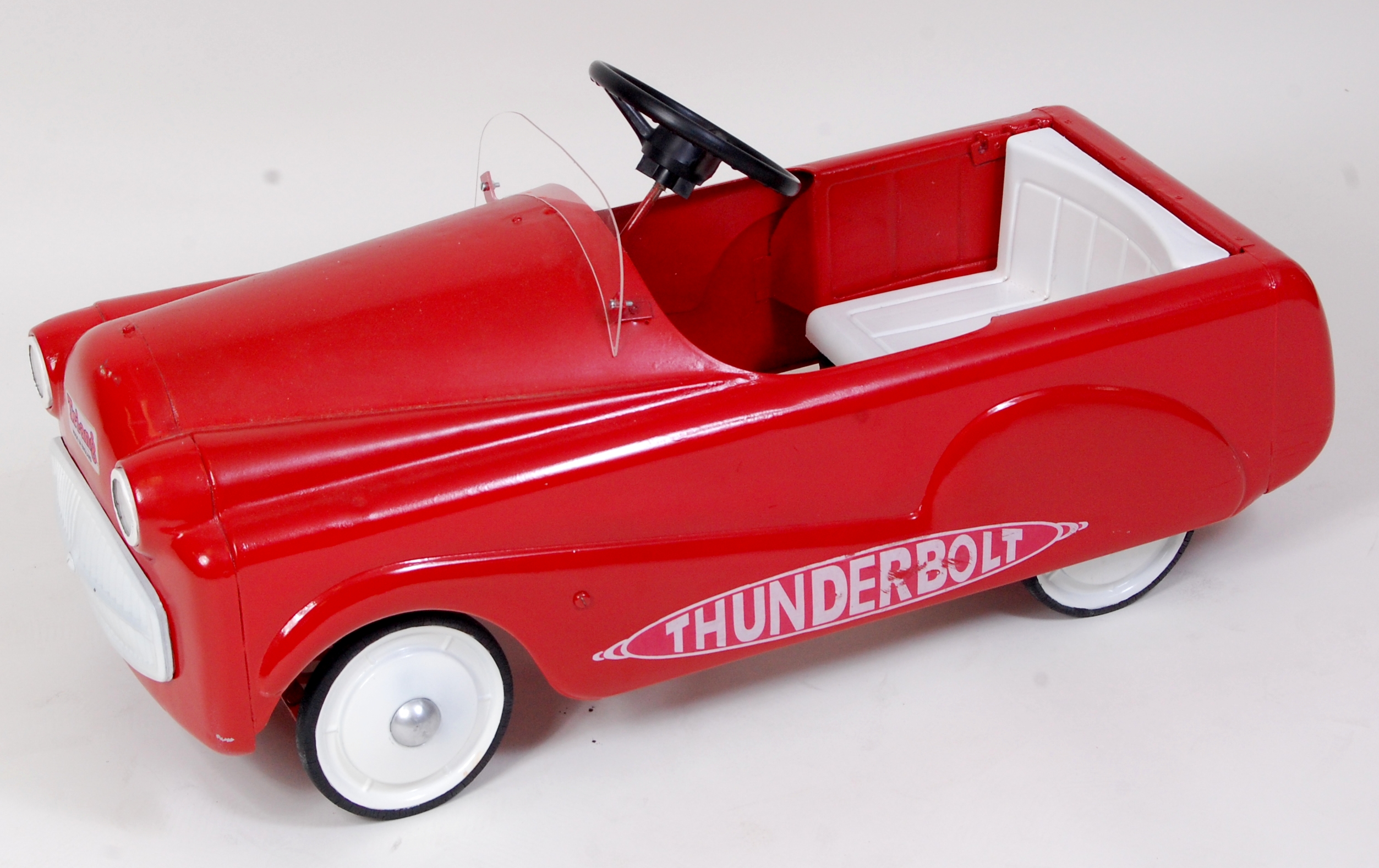 Triang, pressed steel Thunderbolt pedal car, circa 1950s, recently