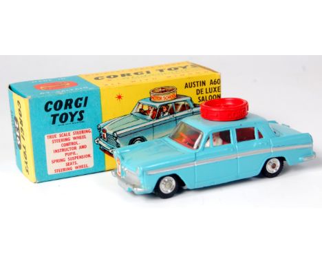 Corgi Toys, 236 Corgi Motor School, light blue body with red interior, two figures, spun hubs, turning wheel in working order