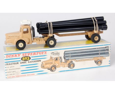 Dinky France, 893 Tracteur unic Saharien, pipe transporter, beige body, white roof, 6 plastic pipes, no defects seen (NM-M,BV