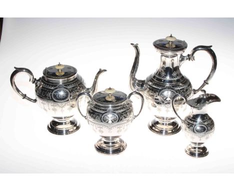 Late Victorian impressive silver plated four piece tea and coffee service having engraved decoration and ivory finials, coffe