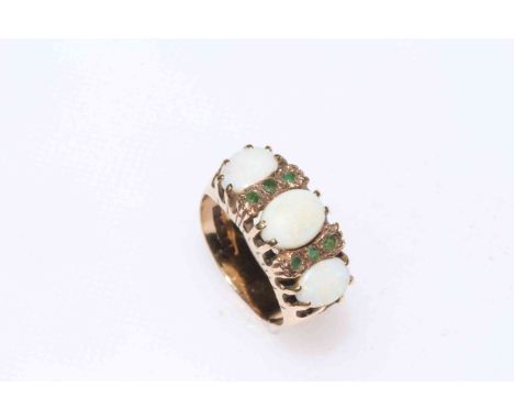 9 carat gold three stone opal and tiny emeralds ring, size J.