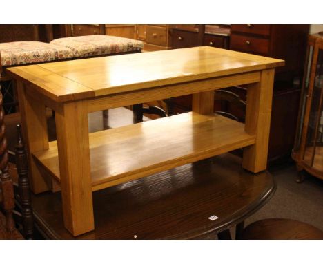 Light oak rectangular coffee table with undershelf, 51cm by 100cm by 50cm.