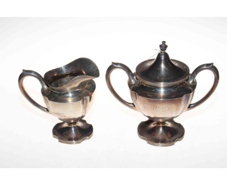 Sterling silver cream jug and lidded sugar basin, basin 19.5cm high, 25 troy oz. CONDITION - Good, commensurate with age 