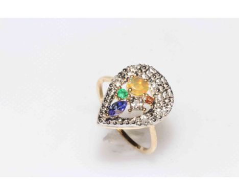 9 carat yellow gold Harlequin ring set with tanzanite, opal, emerald, sapphire and zircon, size S, with certificate.