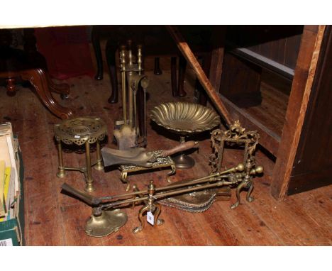 Brassware including ornate easel photograph frame, inkstand, trivets, fire irons, etc.