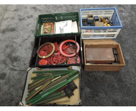A collection of mid 20th century Meccano, accessories and magazines including painted red fly wheels, many boxed motors inclu