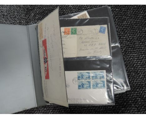 An album of mainly GB First Day Covers, unaddressed with special post marks