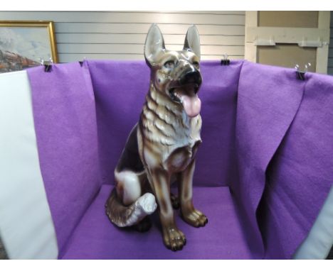 A large ceramic Italian capodimonte style study, German Shepherd, seated, height 28 inches