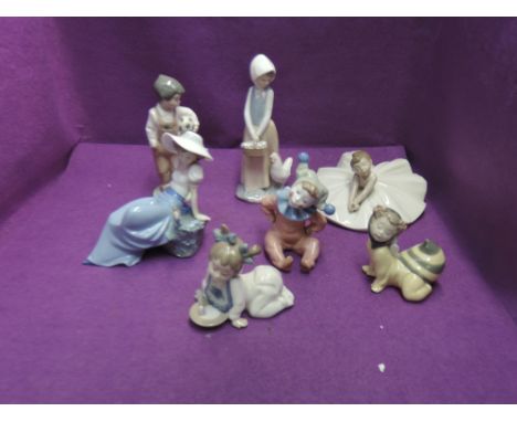 Seven Nao figurines including girls, boys and young children