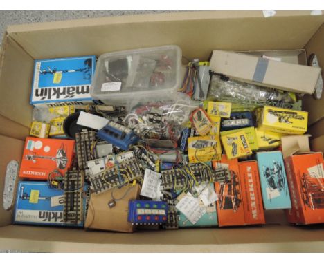 A box of Marklin, Faller and similar HO scale electric signals, points, lamps, control items and similar accessories, many it