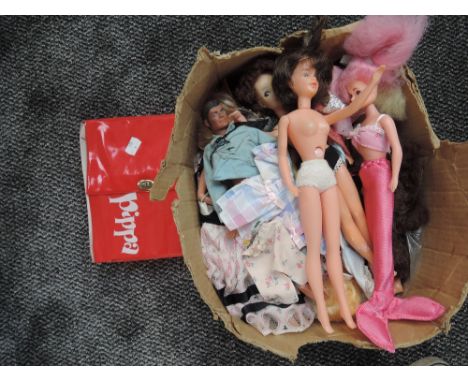 A collection of modern Barbie/Sindy style dolls including Mattel, with clothing and accessories along with a Lone Ranger doll