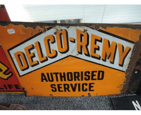 A partial enamel advertising sign for Delco Remy