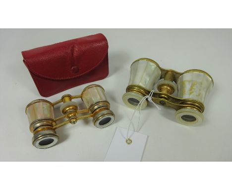 Two pairs of mother-of-pearl opera glasses, one impressed 'Fournier Paris' (2)    Condition Report   Click here for further i