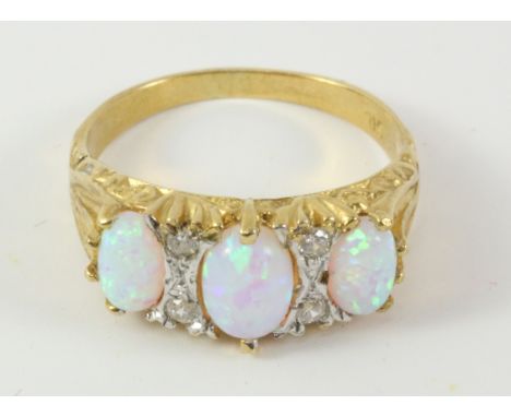 Three stone opal silver-gilt ring stamped 925   Condition Report   Click here for further images, condition, auction times & 