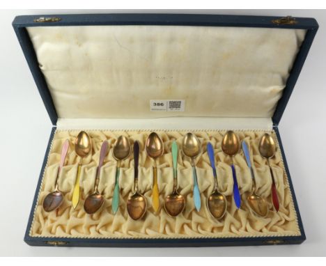 Set of twelve Norwegian silver-gilt enamel coffee spoons by David Anderson Oslo stamped 925S   Condition Report   Click here 