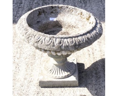 A 20th century reconstituted stone two section urn shaped planter. Of circular form, measuring approximately 48cm diam x H42c