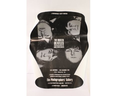 A vintage Biba poster together with a Beatles poster. The Biba showing a lady, measuring 76cm x 51cm