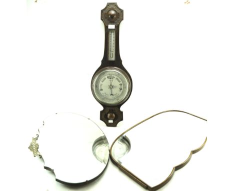 Two wall mirrors and a barometer. The barometer in a carved mahogany case and containing a thermometer, H78cm, the mirrors of