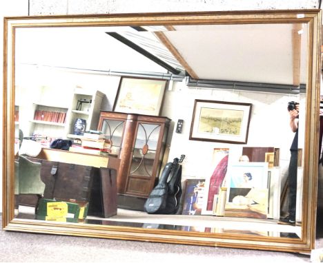 A large gilt framed rectangular bevelled edge wall mirror 197cm x 140cm