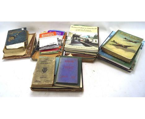 An assortment of books. Including automobile volumes, British rail manual etc