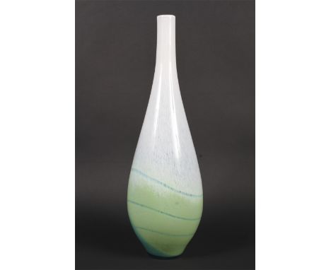 A large coloured baluster art glass vase. Thick walled and coloured in shades of white, green and blue, 55cm high