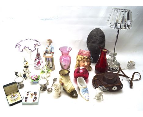 An assortment of collectables. To include enamel Robertsons badges, Fujica 35-ML film camera in case, table lamp etc