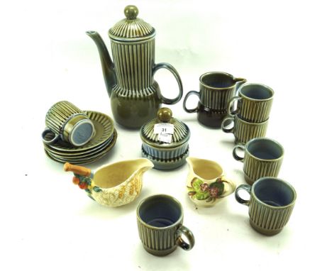 An Irish Wade mid century coffee set. Comprising coffee pot, cups, saucers, sugar bowl and a cream jug, together with two Cla