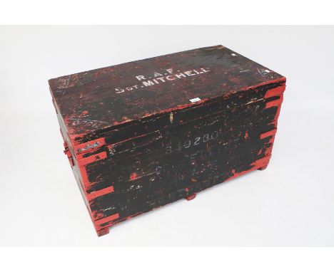 RAF military trunk with remains of black and red paint. White printing to lid reading RAF Sgt Mitchell. L91cm x D50cm x H53cm
