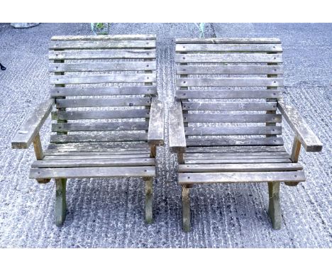 A pair of vintage garden wooden armchairs. With slatted seat and back, 80cm high