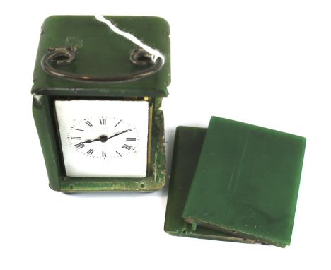 A 20th century carriage clock. The white enamel dial with Roman numerals and marked 'C. Packer', within a green bakelite case