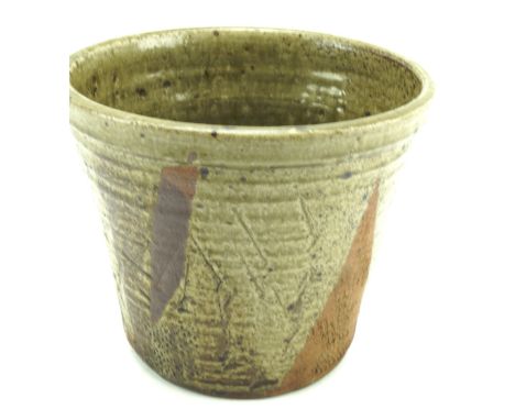 A Marianne de Trey stoneware planter. Glazed in green with geometric shapes, H21.5cm