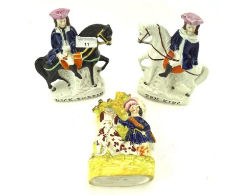 A pair of 19th century Staffordshire pottery equestrian figures of Dick Turpin and Tom King and a spill vase with a Spaniel. 