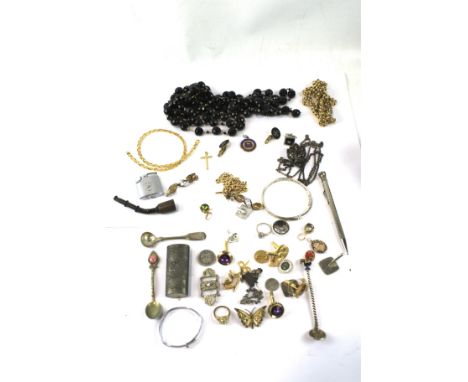 An assortment of costume jewellery and other items. To include chains,. Ronson lighter etc