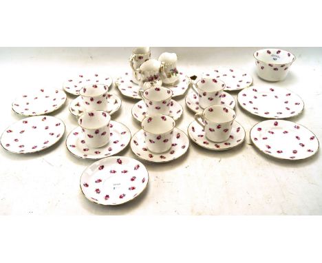 A Ye Olde English Grosvenor china part tea service and two Royal Albert jugs. The teaset including teacups, saucers, cream ju