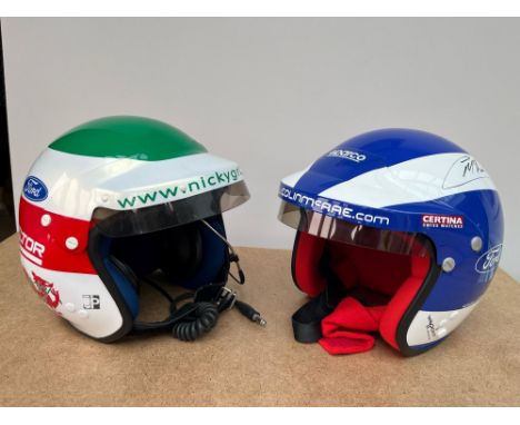 Nicky's helmet was used by him in WRC events, Colin's is a reproduction painted by his personal artist.The McRae helmet was a