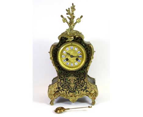 An early 20th century French Boulle and gilt striking mantle clock understood to be in working order, H. 34cm.