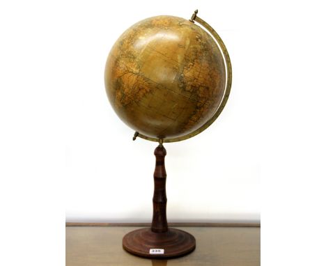 A vintage continental globe on a wooden base, H. 63cm.