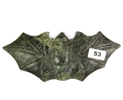 An interesting Chinese carved dark green jade model of a flying bat, W. 27cm.