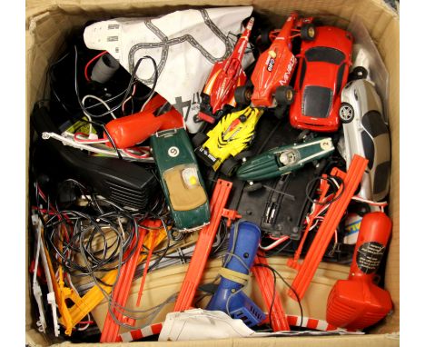 A vintage Scalextric motor racing set including several racing cars.