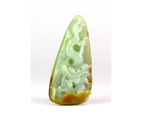 A lovely Chinese russet and pale celadon pebble jade carving of a dragon with a rat, L. 8cm.