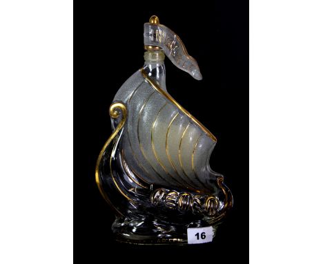 A vintage Cognac Lersen gilded Viking ship bottle, H. 30cm.