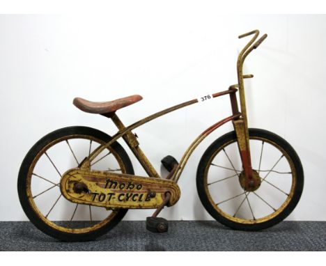 A vintage Mobo Totcycle.
