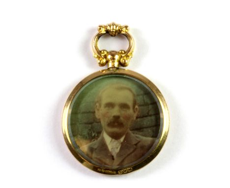 A Victorian 9ct yellow gold mounted portrait pendant.