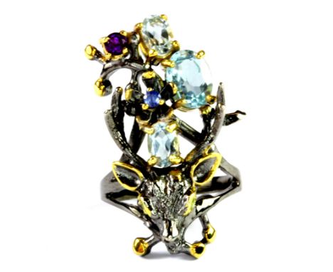 A Hana Maae silver gilt deer head shaped ring set with blue topaz, amethyst, peridot and sapphire (N.5).