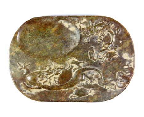 A Chinese carved mixed colour jade / hardstone ink grinding stone decorated with dragons, W. 17cm x 12 x 2cm.