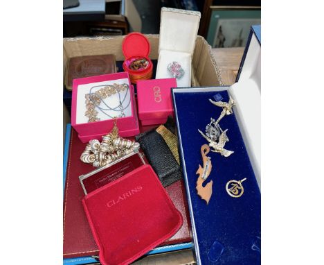 A box of costume jewellery with cigarette lighter, compact case and Clarins eyeshadow box 